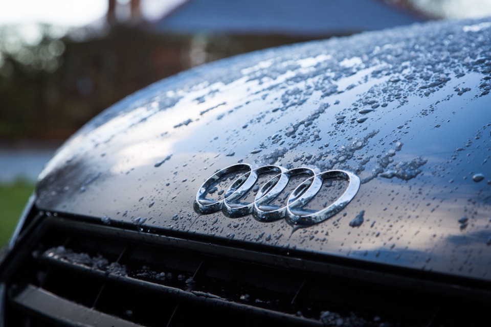 Water beading tightly on a ceramic coated black hood