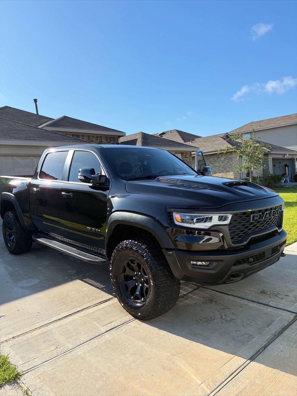 Black RAM TRX detailed on a Katy driveway